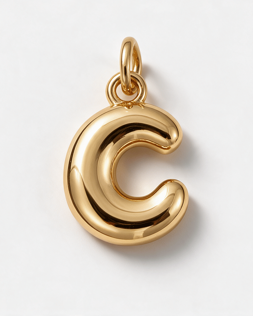 A polished gold letter 'C' pendant charm with a smooth, reflective finish, shown on a clean white background.