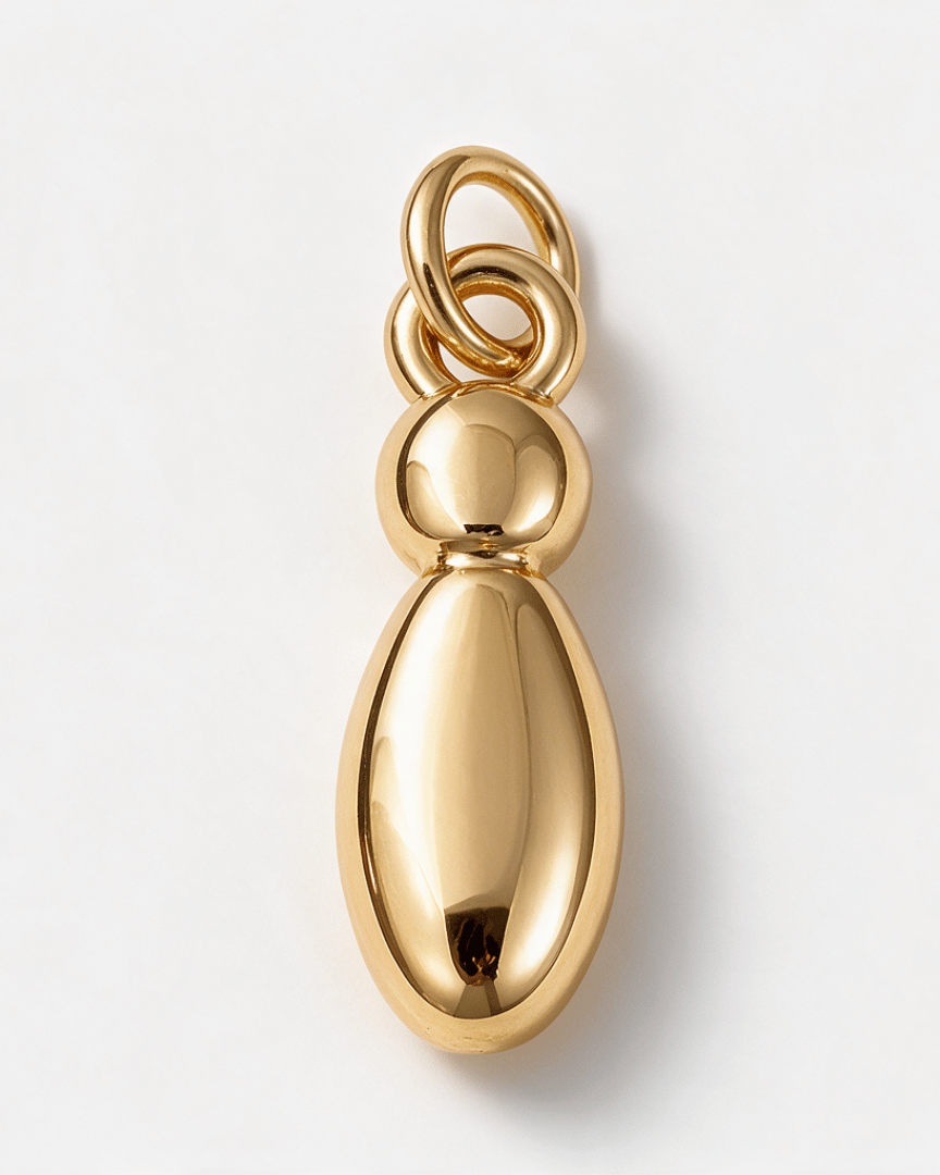 A polished gold pendant with a teardrop-shaped body, a smaller rounded top section, and a three-loop bail at the top, shown on a clean white background.