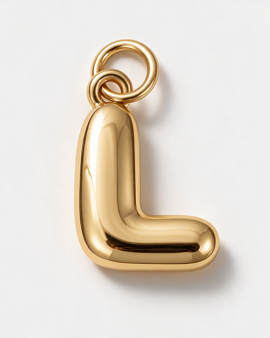 A polished gold letter 'L' pendant charm with a smooth, rounded organic shape and a top loop, shown on a clean white background.