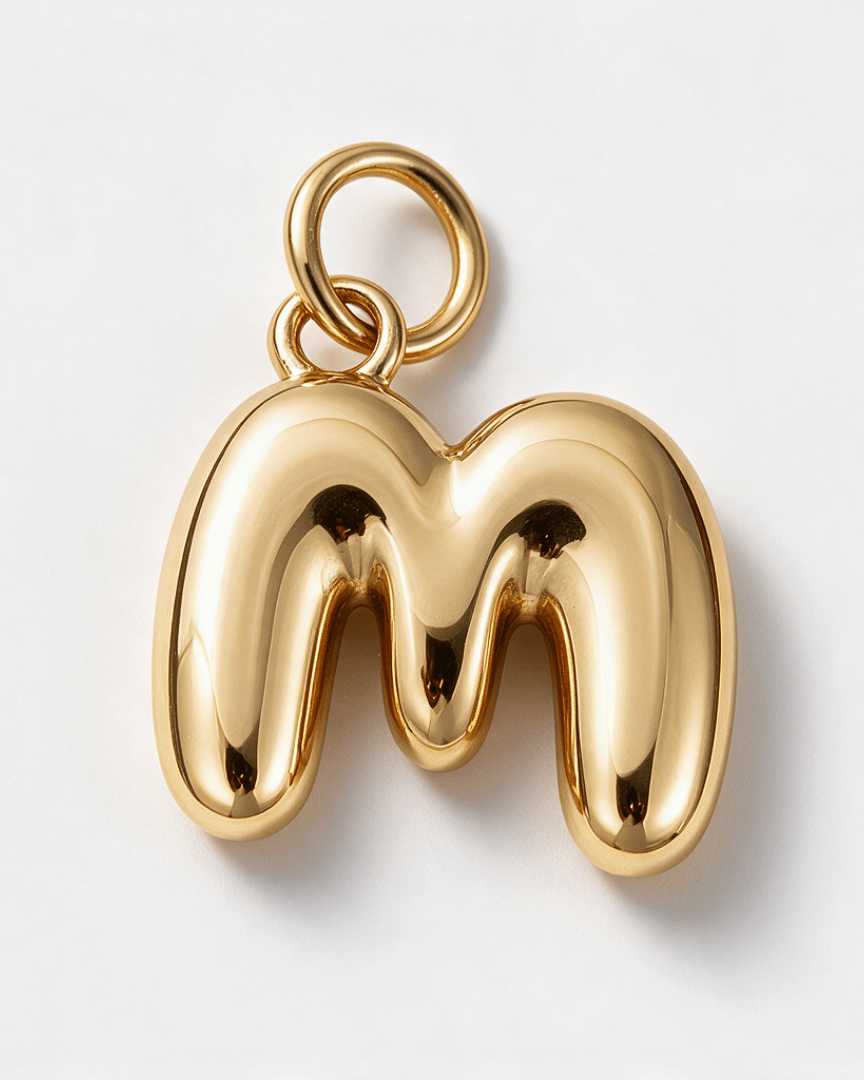 A shiny gold letter 'm' pendant charm with a smooth, glossy finish and a top loop, shown on a clean white background.