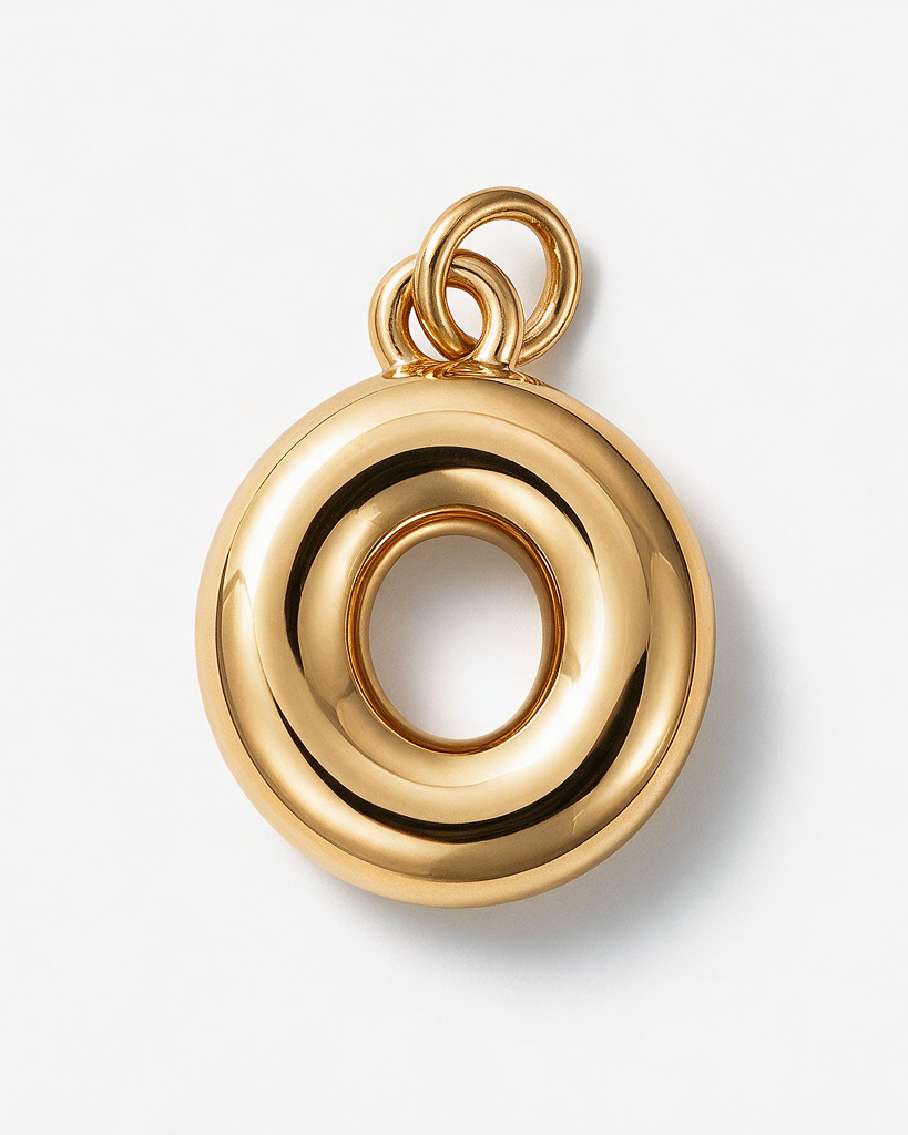 A polished gold pendant with a textured, layered donut-like circular design and a top loop, shown on a clean white background.
