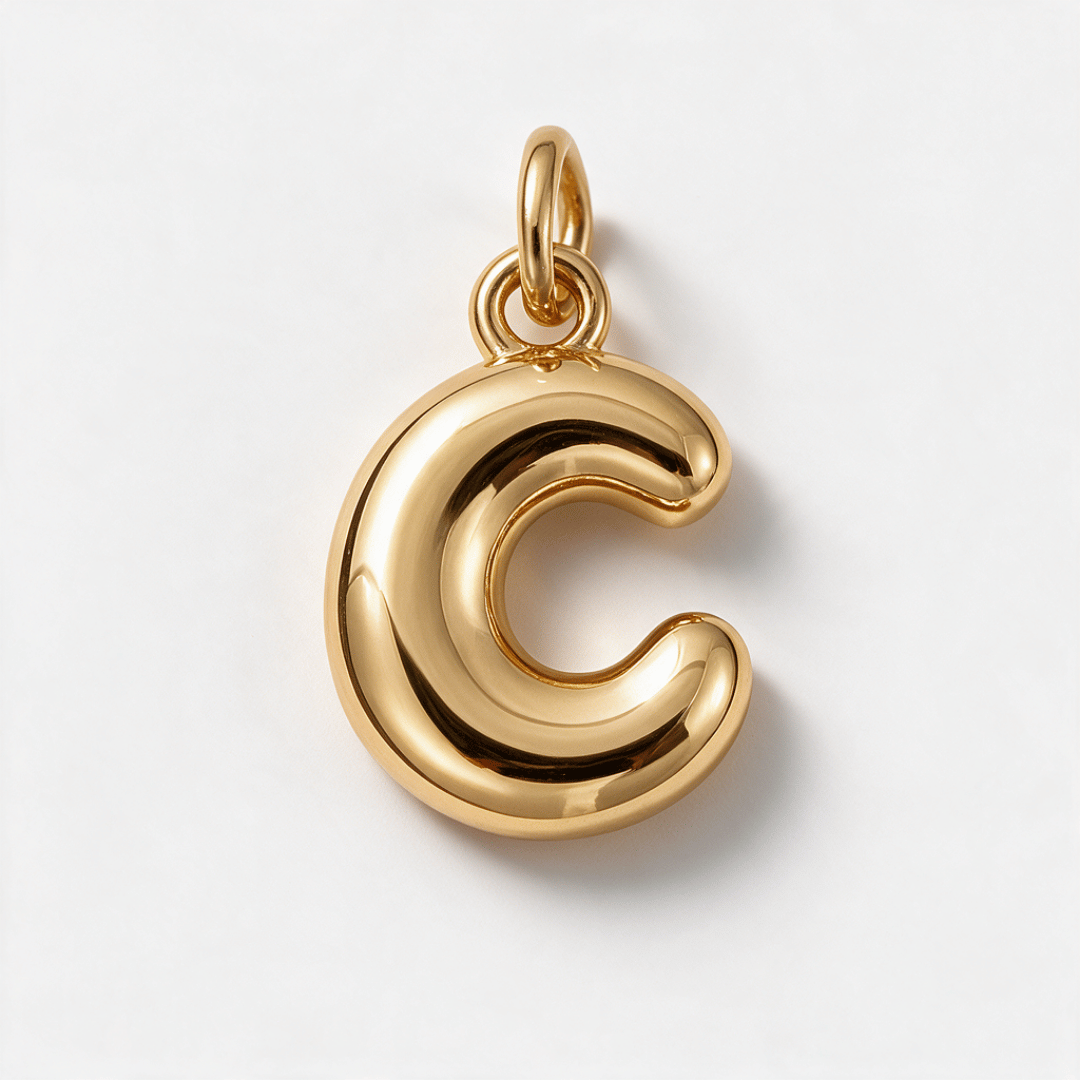 A polished gold letter 'C' pendant charm with a smooth, reflective finish, shown on a clean white background.