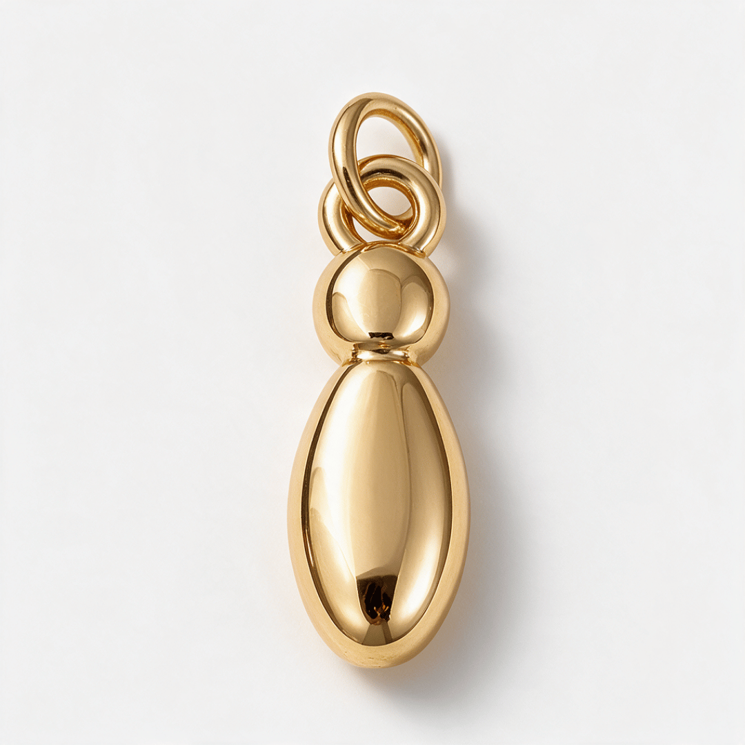 A polished gold pendant with a teardrop-shaped body, a smaller rounded top section, and a three-loop bail at the top, shown on a clean white background.