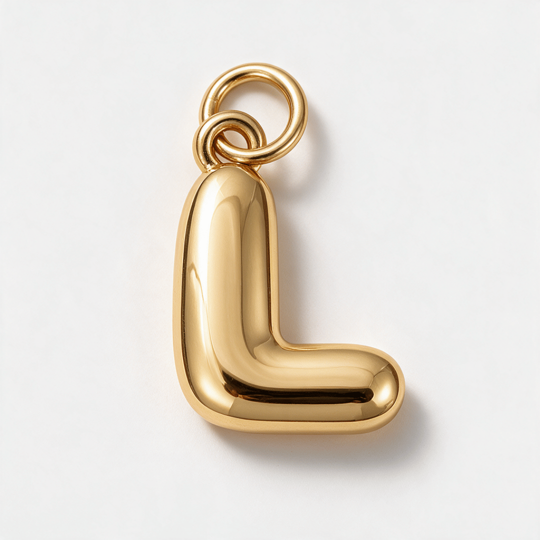 A polished gold letter 'L' pendant charm with a smooth, rounded organic shape and a top loop, shown on a clean white background.